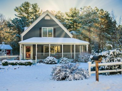 home with snow on the ground