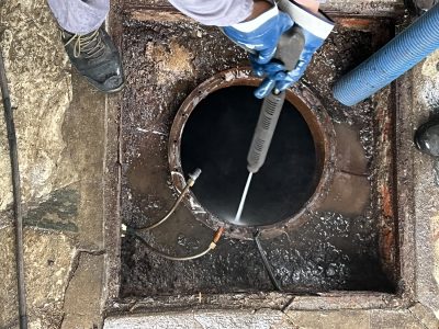 High pressure hydro jet cleaning in pipes to break off debris and leave the inside of a pipe clean.
